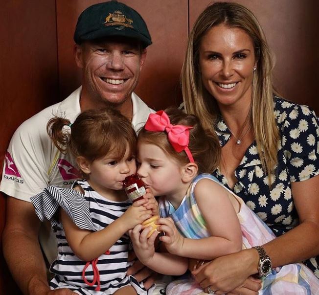 Candice Warner with her husband David and daughters