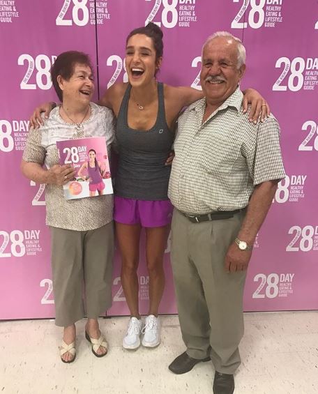 Kayla with her grandparents