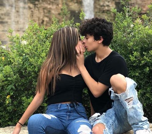 Baby Diego kissing his girlfriend