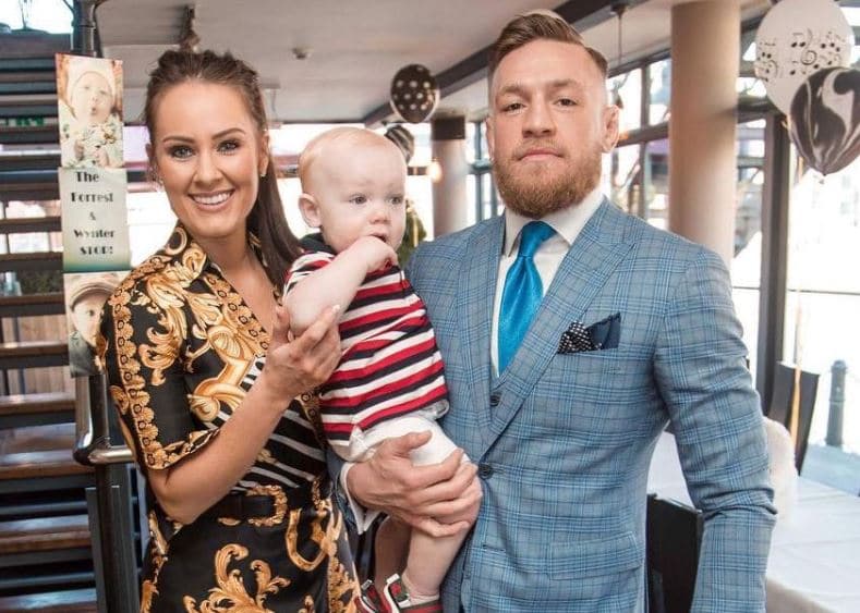 Conor with his girlfriend, Dee Devlin and son